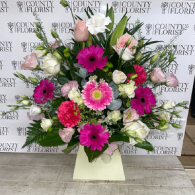 Front facing - A front facing arrangement in oasis In pinks and whites