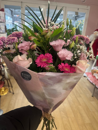Pink wrap - A selection of pink flowers wrapped in paper