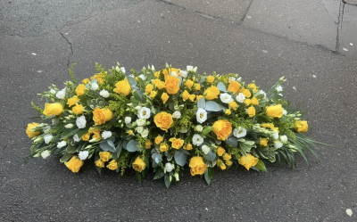Yellow & white casket spray - A mix of roses , spray roses and Eustoma